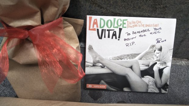 A La Dolce Vita CD was left on Bourke Street on Saturday in tribute to Pellegrini’s co-owner Sisto Malaspina.