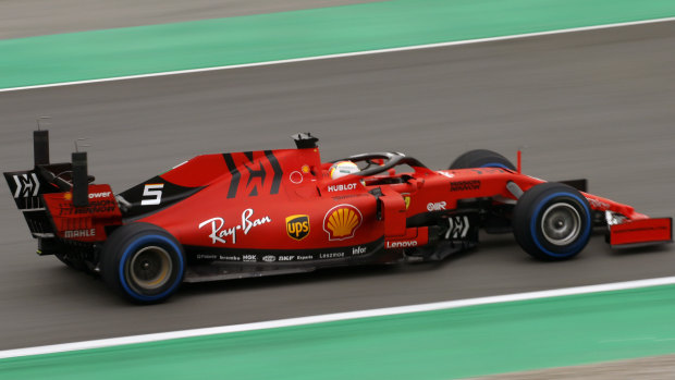 Ferrari's Sebastian Vettel takes his car through its paces at F1 testing in Barcelona.