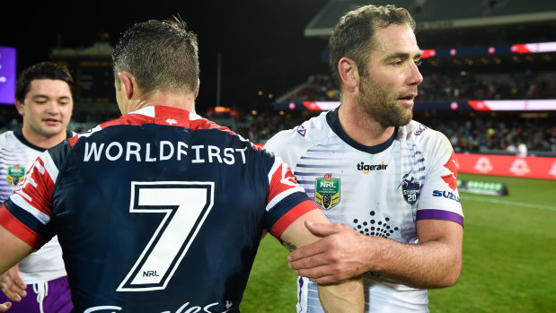 Brushed: Suggestions of a rift between Cooper Cronk and Cameron Smith were fuelled when they didn't embrace after a game between the Roosters and Storm in Adelaide last month.