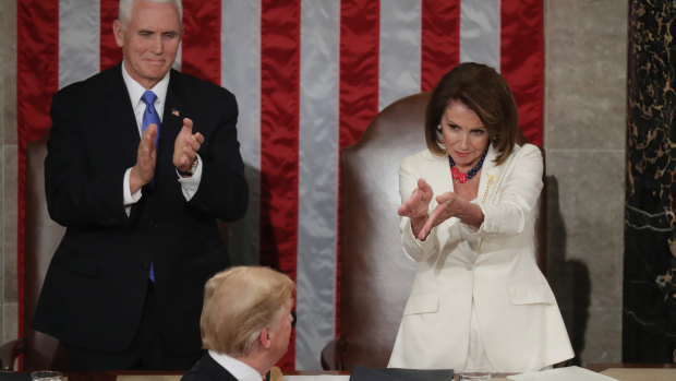 Then-Vice President Mike Pence and Speaker Nancy Pelosi greet President Donald Trump just ahead of the State of the Union address in in 2019.