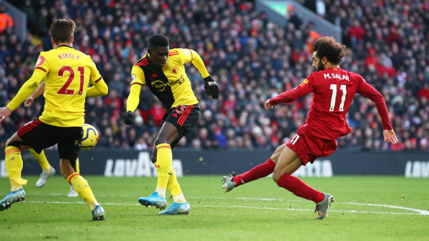 Mohamed Salah opens the scoring for Liverpool against Watford at Anfield.
