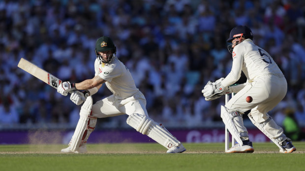 Australia's Matthew Wade plays a shot off the bowling of England's Joe Root