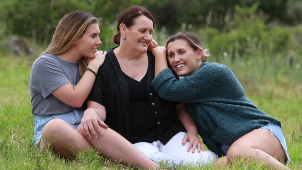 Rhonda Murray with her daughters Annie and Cassie. 