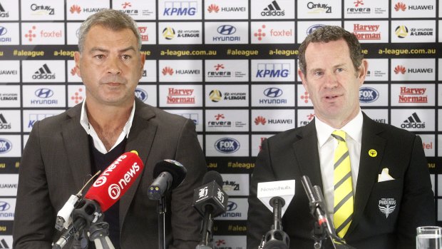 Awkward: Mark Rudan (left), in a file photo alongside Phoenix GM David Dome, is fuming about their fixture switch.