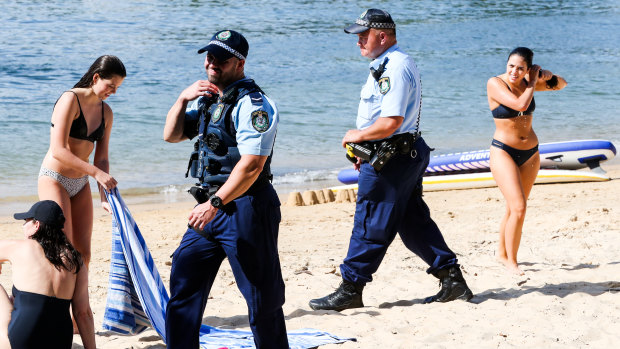 Police close down Balmoral Beach on Sunday.