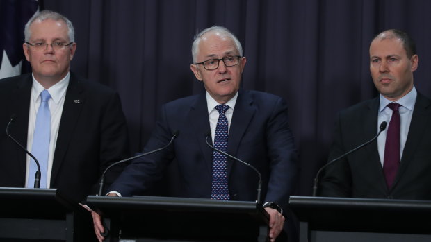 Prime Minister Malcolm Turnbull, Treasurer Scott Morrison and Minister for Environment and Energy Josh Frydenberg at Parliament House.