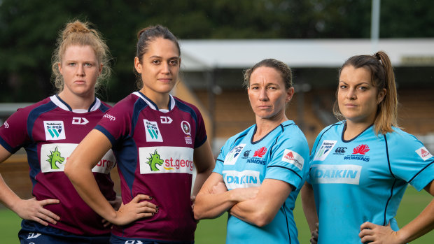 Game on: Queensland's Averyl Mitchell and Kiri Lingman can't wait to do battle against Waratahs captain Ash Hewson and back-rower Grace Hamilton. 