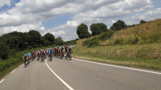 Packing heat: The pack rides during the fifth stage of the Tour de France over 204.5 kilometers.