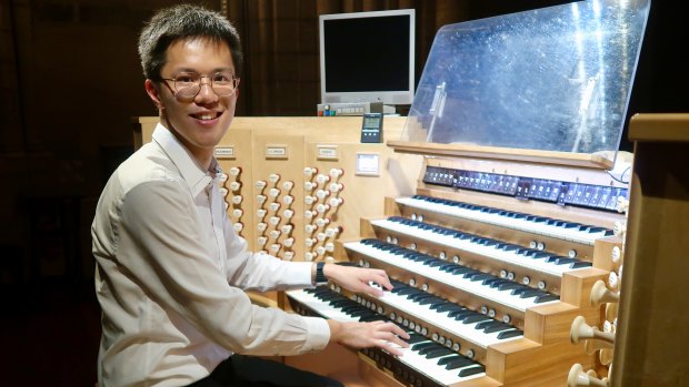 Edwin Kwong playing the Notre-Dame organ. 