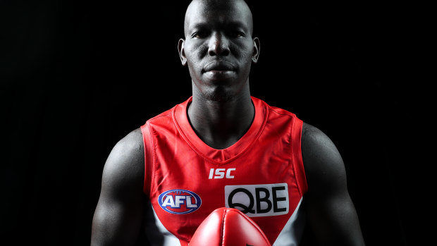 Sydney Swans player Aliir Aliir on racist assumptions:  "You have to put on a fake smile ... so they don't think you'll attack them."