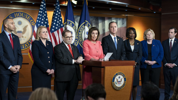 US House Speaker Nancy Pelosi introducing the team of seven managers.  From left are Reps. Hakeem Jeffries, Sylvia Garcia, House Judiciary Committee Chairman Jerrold Nadler, Speaker Pelosi, House Intelligence Committee Chairman Adam Schiff, Val Demings, Zoe Lofgren, and Jason Crow. 