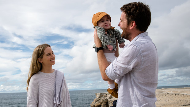 "Everything he’s faced so far, he’s faced with a smile. He’s my hero": Adam and Alice Mitchell, with baby Spencer.