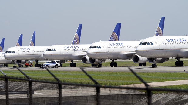 Grounded United Airlines planes parked at an airport in Texas. The industry expects it will take years to recover from the pandemic.