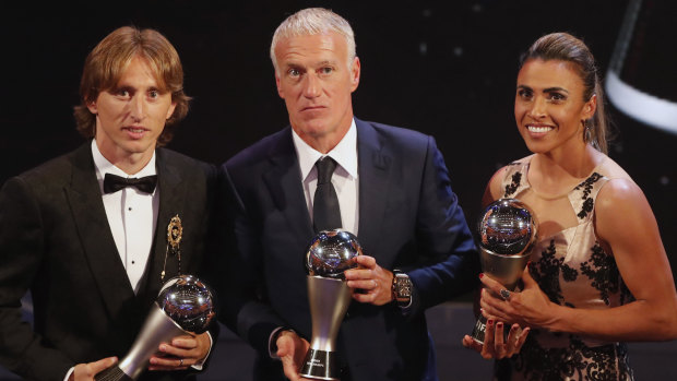 Marta, alongside Modric and France's men's coach of the year Didier Deschamps, won the women's honour for the sixth time.