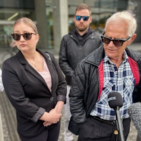 Vyleen White’s husband, Victor, and their daughter, Julie, speaking outside the Supreme Court in Brisbane.