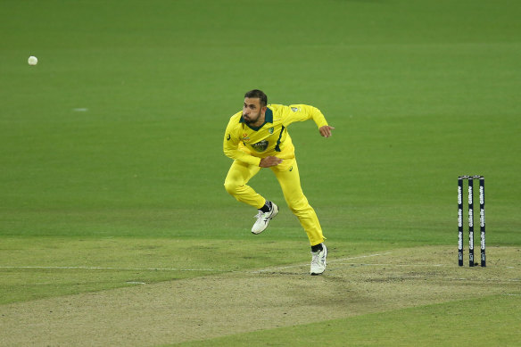 Fawad Ahmed bowling for the PM'S XI in Canberra last month.