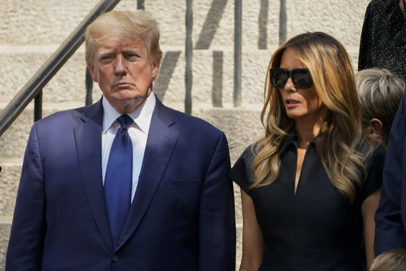 Former president Donald Trump and Melania Trump depart the funeral of Ivana Trump on Wednesday, US time.