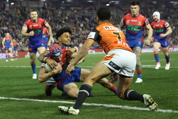 Kalyn Ponga scores for the Knights on Friday night.