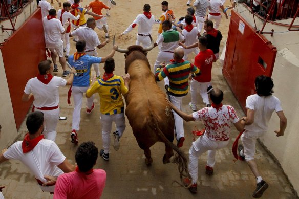 The running of the bulls at the San Fermin festival in Spain.
