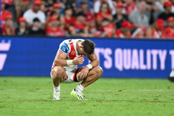 Zac Lomax of the Dragons looks dejected against the Dolphins.