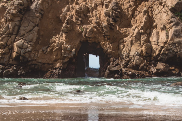 Calirfornia’s Pfeiffer Beach stands out with unearthly purple sand.