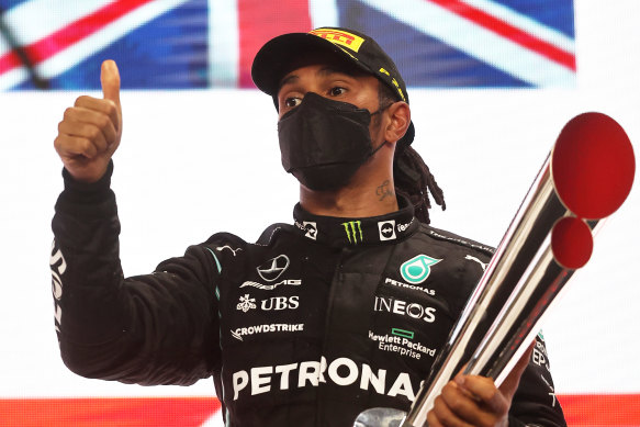 Lewis Hamilton on the podium in Doha.