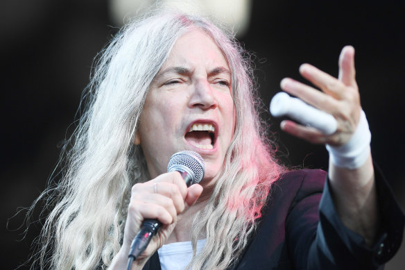 Patti Smith, her hair now a mercury shroud.