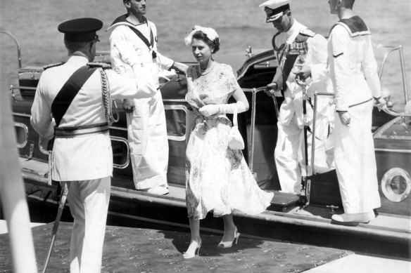 The moment the Queen stepped ashore in Australia, at Farm Cove, in 1954.