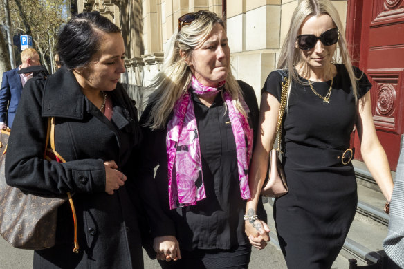 A teary Tracey Gangell (centre), Price’s mother, leaves court on Friday. 