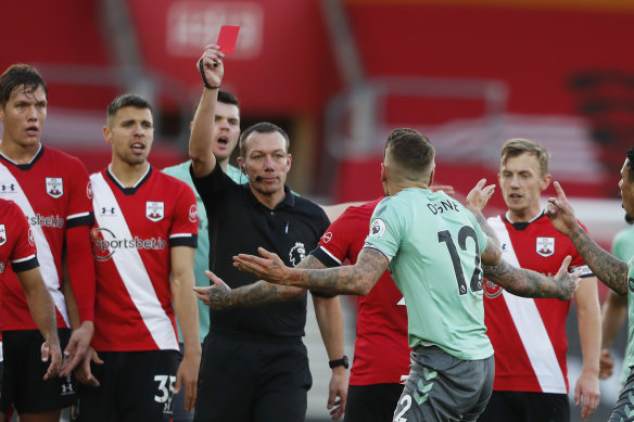 Referee Kevin Friend gives Everton's Lucas Digne is marching orders after a foul on Southampton's Kyle Walker-Peters.