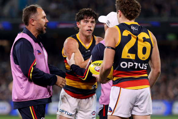 Concussed: Ned McHenry after the tackle from Scott Lycett.