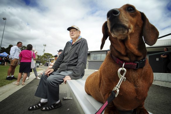 Basil Cocks, 98, with his dachshund Elsa, who travelled from Reservoir for the derby.