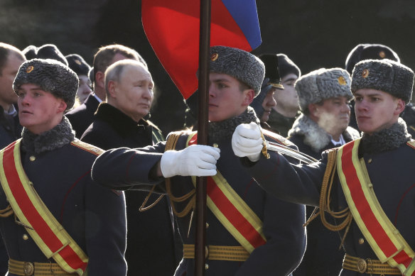 Russian President Vladimir Putin attends a wreath-laying ceremony at the Unknown Soldier’s Grave in the Alexander Garden during the national celebrations of the “Defender of the Fatherland Day” in Moscow, Russia.