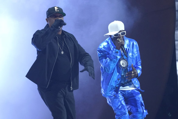 Flavor Flav (right) performs with Public Enemy bandmate Chuck D at the 2023 Grammy Awards.