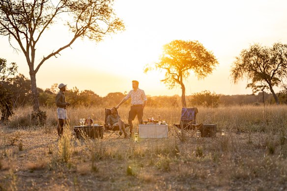 Sundowners at the Anantara Kafue River Tented Camp.