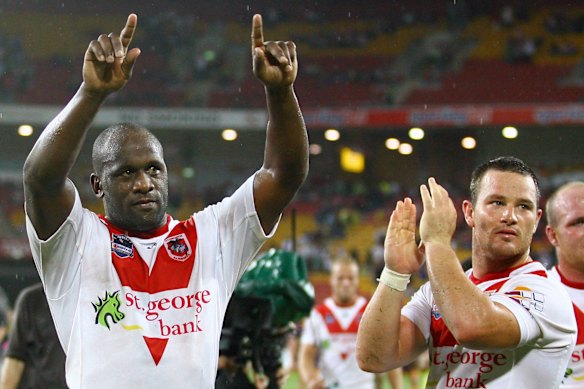Wendell Sailor pictured with Dragons teammates after a victory in 2009.