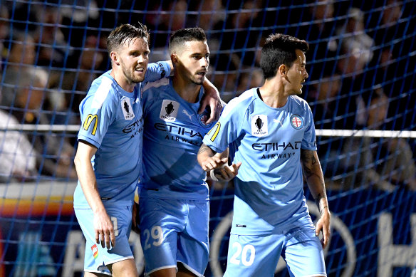 Jamie Maclaren (centre) is back for City's clash with Adelaide on Sunday.