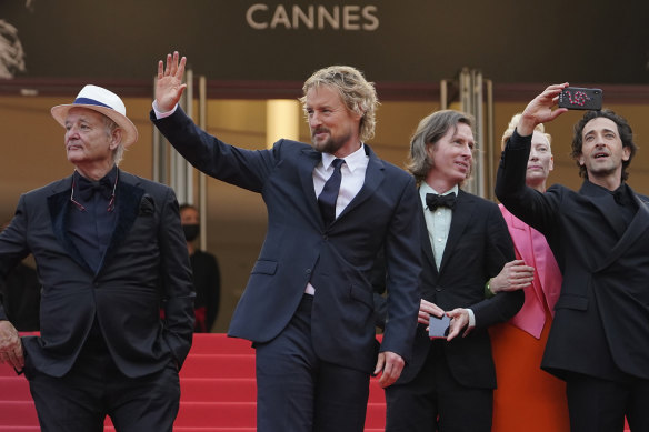 Bill Murray, Owen Wilson, director Wes Anderson, Tilda Swinton, and Adrien Brody arrive at the premiere of The French Dispatch at Cannes.