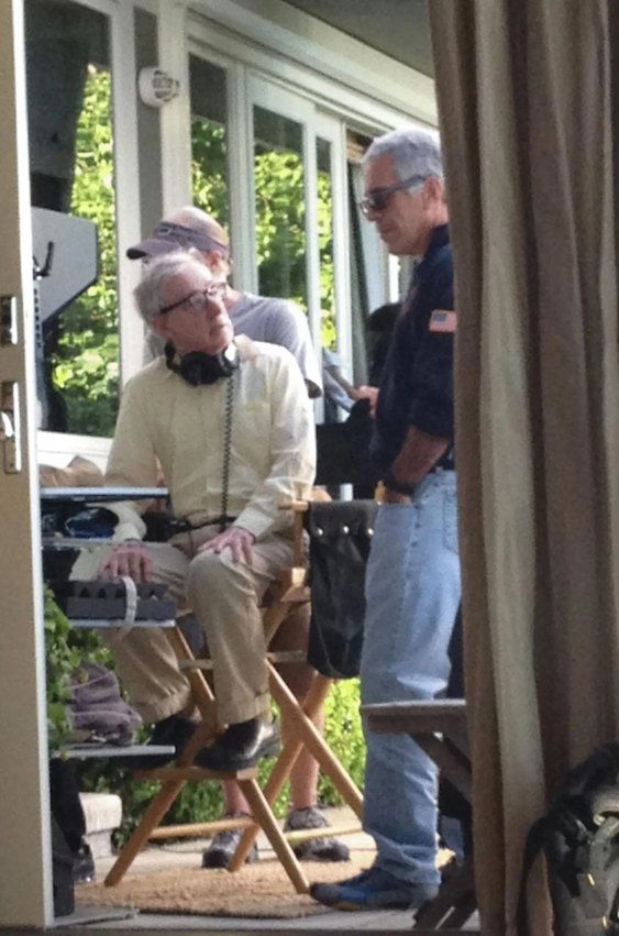 Another image, released by the House oversight committee Democrats, shows Allen looking up at Epstein who was presumably visiting him on a film set.