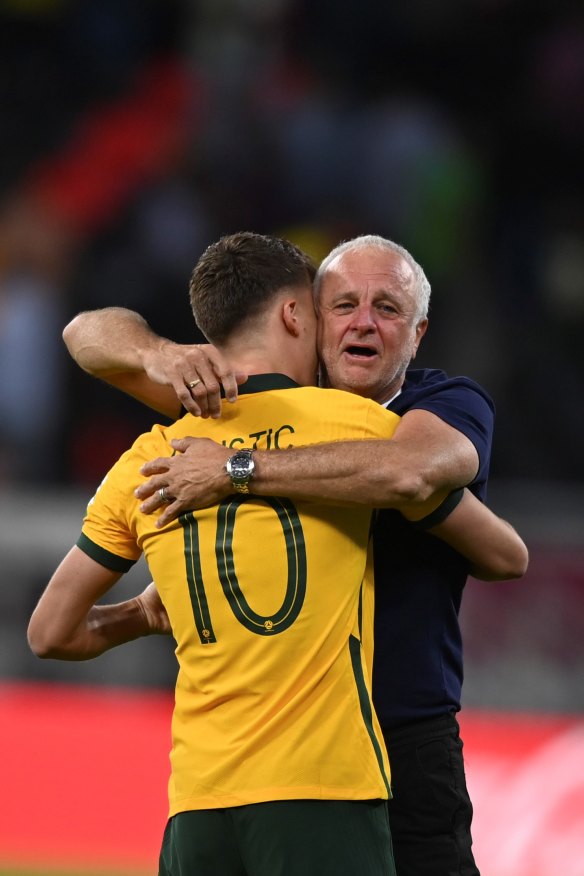 Arnold and player Ajdin Hrustic celebrate their victory against Peru.