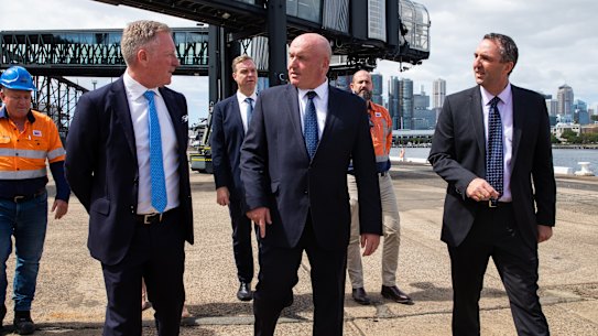 Carnival Australia senior vice-president Peter Little, left, Transport Minister David Elliott and Port Authority chief executive Philip Holliday at the White Bay Cruise Terminal  on Monday.
