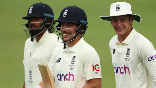 Rory Burns leaves the field as rain delays play during day one of the Tour Match between England and the England Lions at Redlands Cricket.