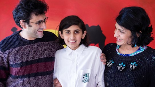 Thirteen-year-old Smit Shilpatul with his parents.