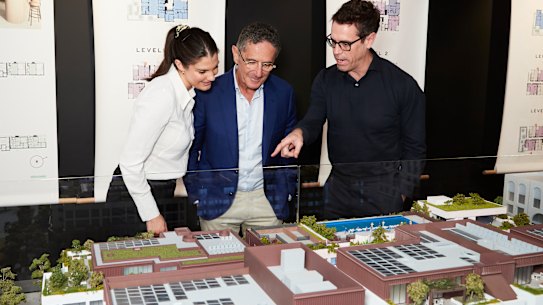 Buyers Lillie and Tim Robinson with TOGA Group managing director Allan Vidor.