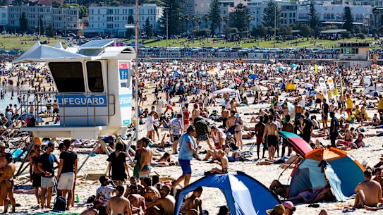 Bondi Beach was almost at full capacity but still open on Monday. 
