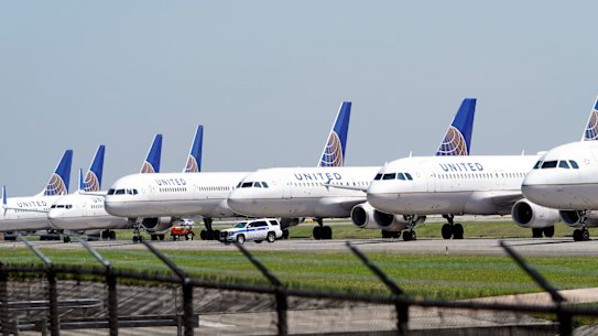 Grounded United Airlines planes parked at an airport in Texas. The industry expects it will take years to recover from the pandemic.