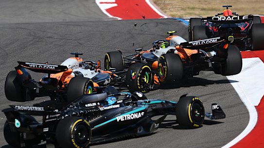 Oscar Piastri and Lando Norris collide.