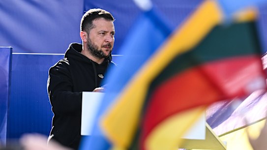VILNIUS, LITHUANIA - JULY 11: The President of Ukraine, Volodymyr Zelenskyy stands on the stage during the Raising the Flag for Ukraine NATO event  on July 11, 2023 in Vilnius, Lithuania. The Ukrainian president visited the city as it hosts a summit of NATO heads of state. A top agenda item during the summit is Russia’s war in Ukraine, along with discussions of a future path for Ukraine to join the alliance, a subject on which NATO leaders are divided. (Photo by Omar Marques/Getty Images)