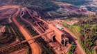 Analysts expect the wave of fresh supply from Guinea will tip iron ore markets into a surplus next year.
