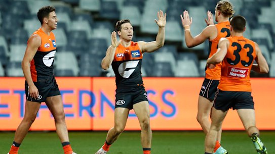 GEELONG, AUSTRALIA - AUGUST 06: Toby Greene of the Giants celebrates a goal  during the round 21 AFL match between Geelong Cats and Greater Western Sydney Giants at GMHBA Stadium on August 06, 2021 in Geelong, Australia. (Photo by Darrian Traynor/Getty Images)